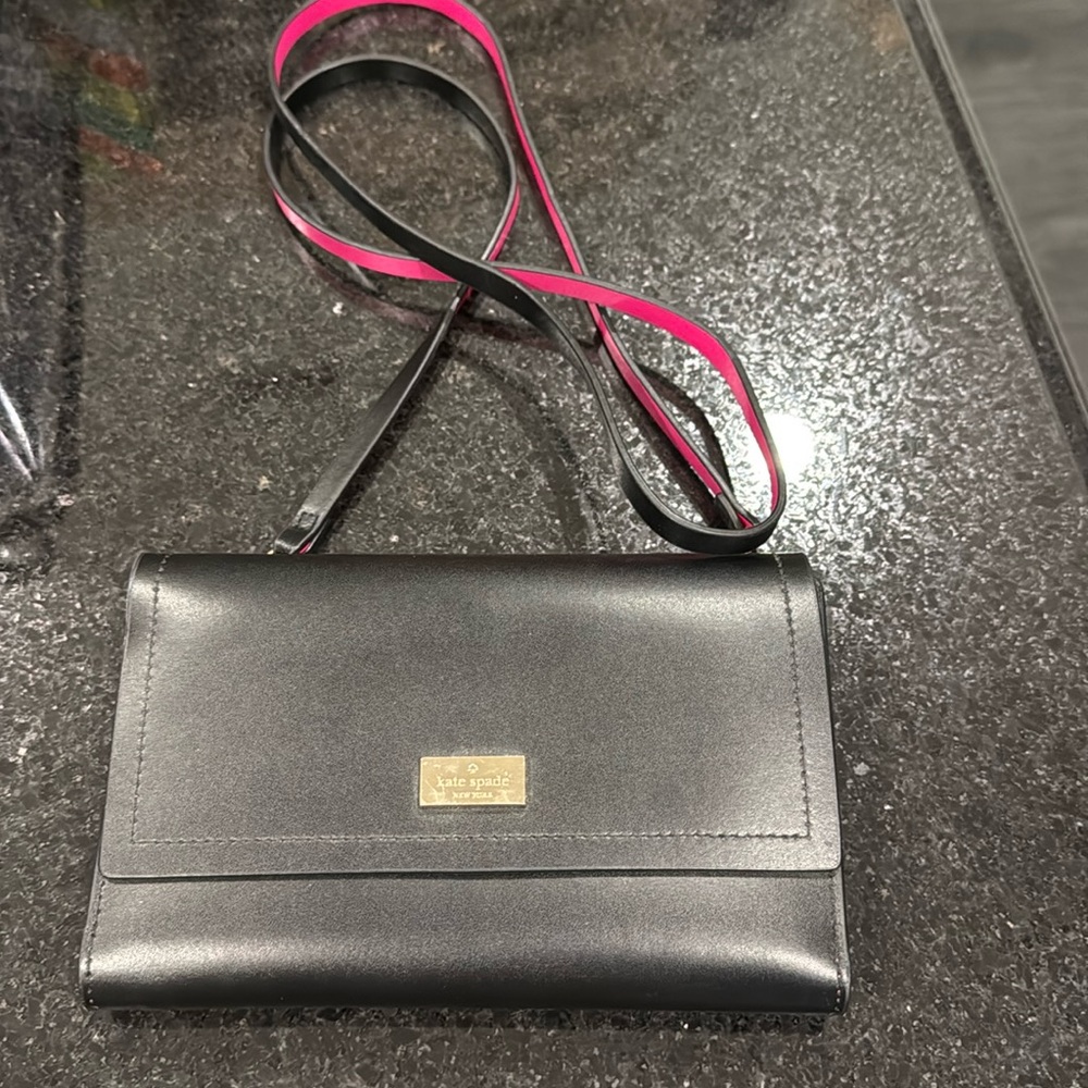 Kate Spade crossbody black and pink wallet/purse. Brand new never used. No tags